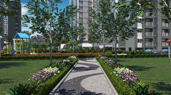 A pebbled foot reflexology path between lawns at Sattva Aeropolis, artist's impression