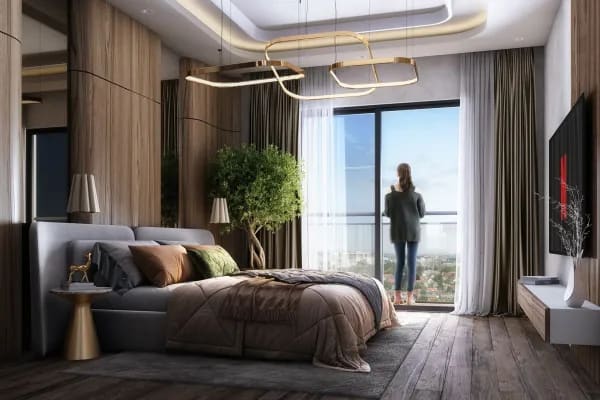 The master bedroom of a Sattva Forest Ridge home, with a window onto the trees, artist's impression