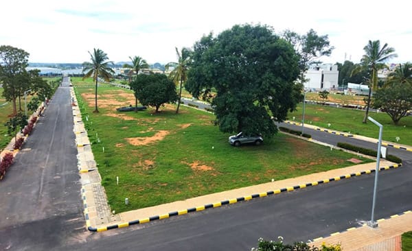 Bird view of plots between the internal roads at Sattva Green Groves, site photo, September 2026