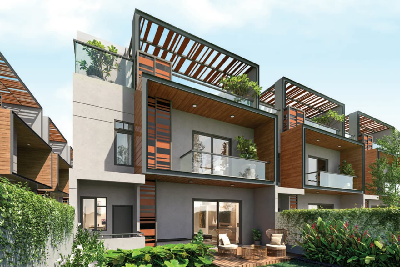 A Sattva La Vita row house villa with its backyard garden, deck and pergola terrace in the sun, artist's impression