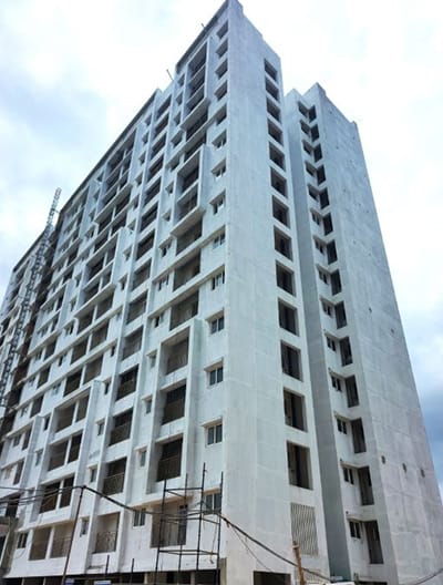 A Phase II tower with its facade plastered, September 2026 site photo