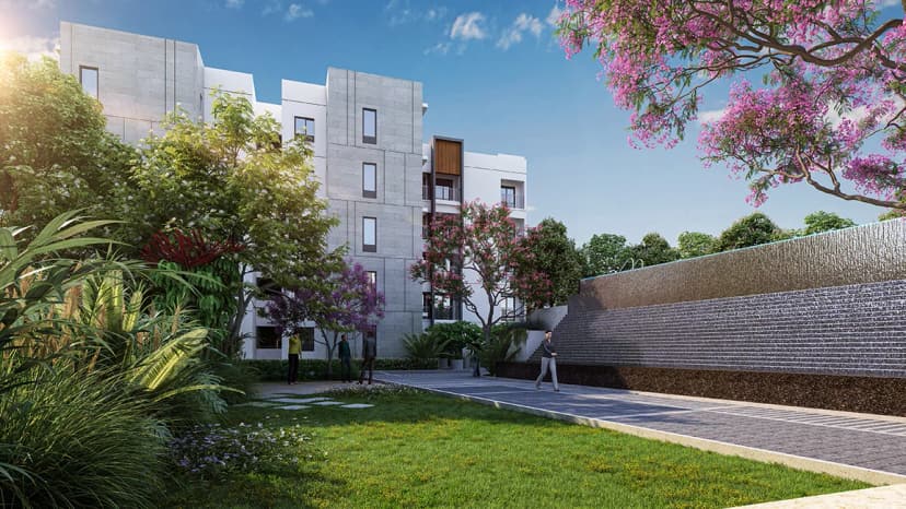 The party lawn under flowering trees beside the apartment blocks of Sattva SimpliCity, artist's impression