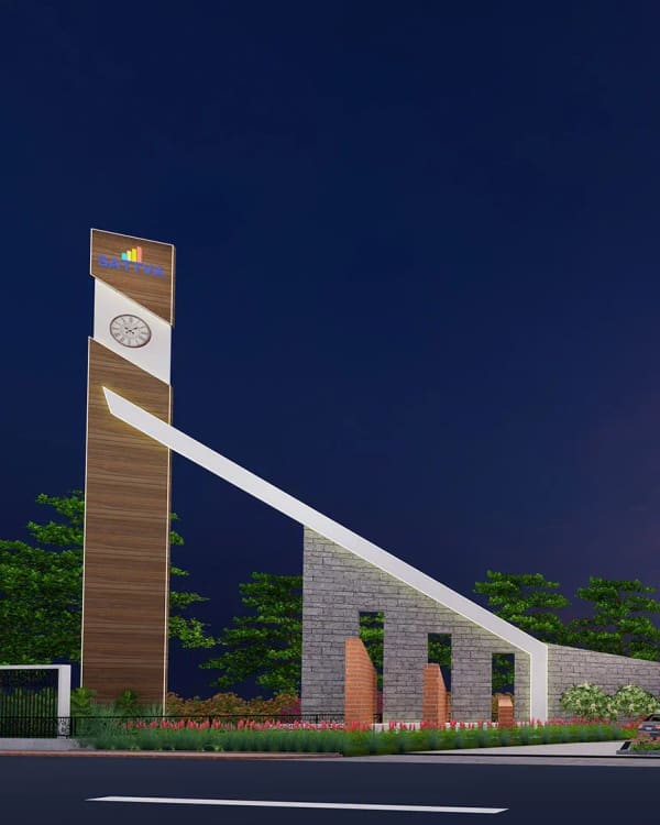 The Sattva Songbird entrance gate and its clock tower at dusk, artist's impression