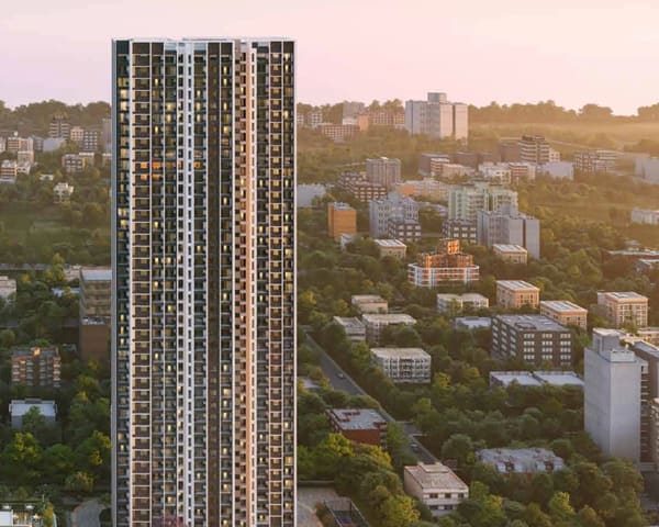 Tower 5 of Sattva Songbird Phase II at golden hour, seen from above, artist's impression