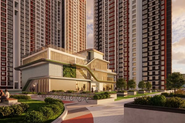 The Phase II clubhouse with its green facade and the towers behind, artist's impression