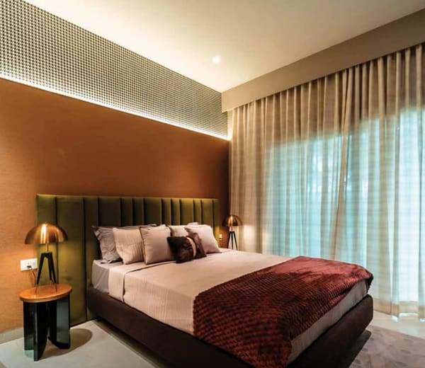 Bedroom of the model apartment, a representational photograph