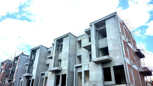 Block 3 at Sattva Springs with construction and plastering under way, a site photo from September 2026