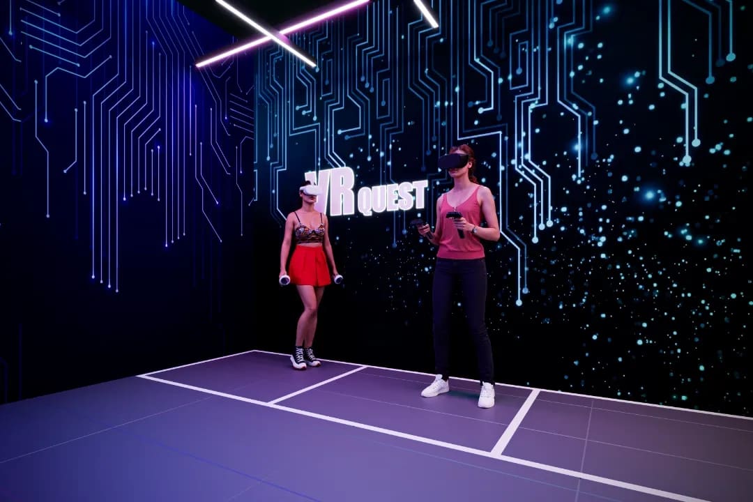 VR Quest, a virtual reality room with a circuit pattern wall, artist's impression