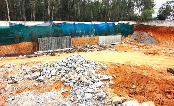 Sattva Vasanta Cove site in September 2026, retaining wall formwork, site photo