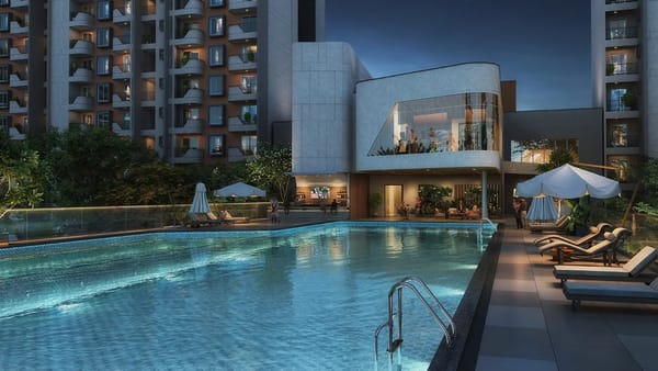 The clubhouse swimming pool at dusk with the towers behind, artist's impression