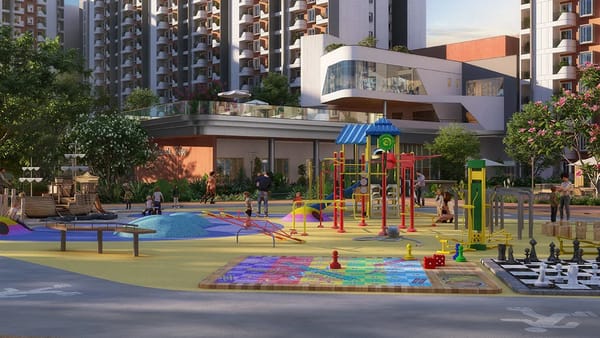 The kids' play area with colourful play equipment and the towers behind, artist's impression