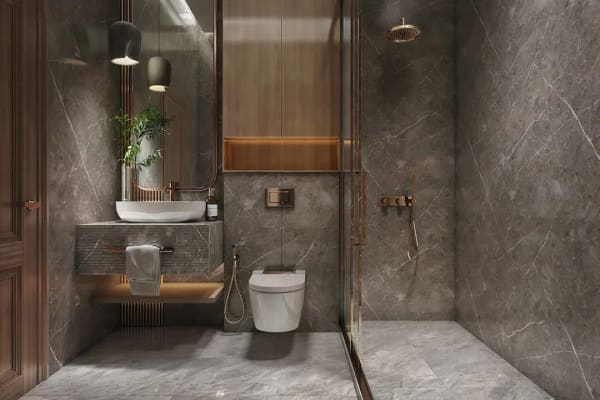 Sattva Vasanta Skye bathroom in grey stone with a vanity basin and a wall mounted WC, artist's impression